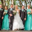 whole bridal party holding hands