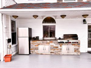 Outdoor grill and refrigerator